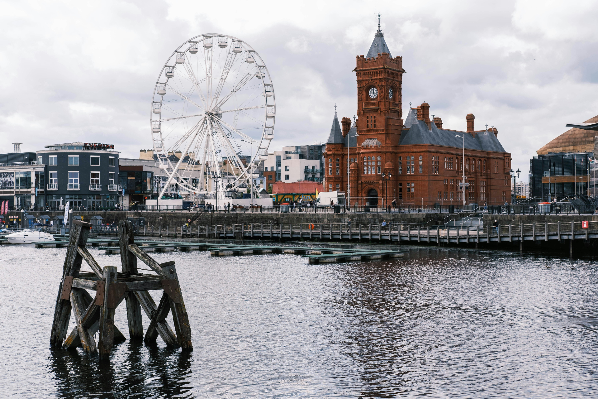 Cardiff Bay waterfront with Pierhead Building and ferris wheel