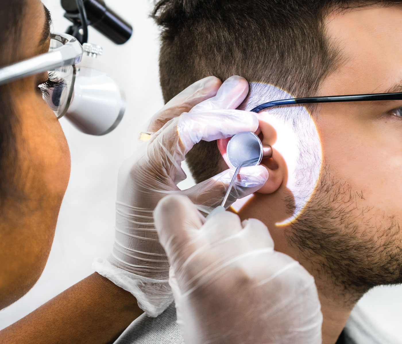 Microsuction earwax removal being carried out by an audiologist in Cardiff